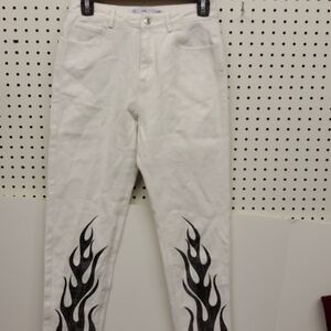 ADIKA jeans white with black flames accents lower legs.  NWOT size small